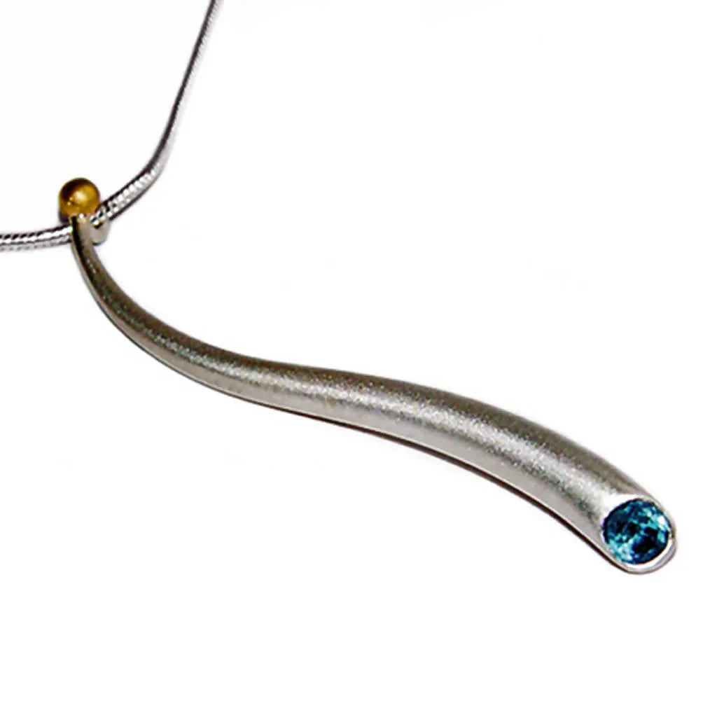 Curving silver wiggly pendant with blue topaz & 18K gold detail